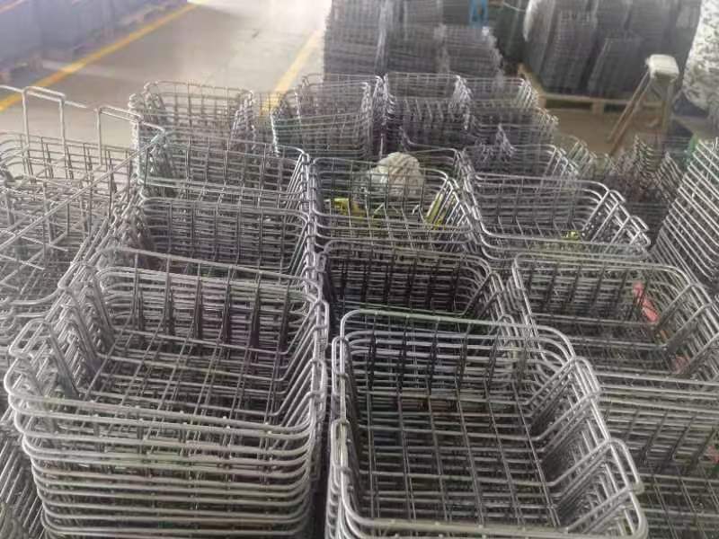 Wire baskets stacked in factory